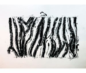 Zebra skin rubbing plate.