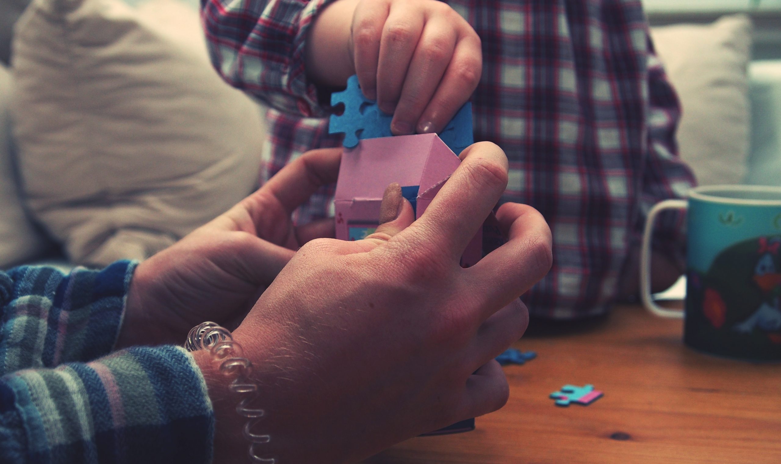 Doing puzzles with family.