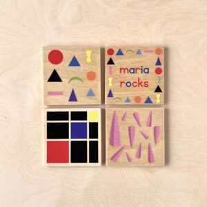 Maria Rocks wooden coasters with iconic Montessori themed images.