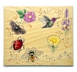Wooden pollinator puzzle with plants and animals